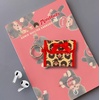 image:imageSonix Quilted Earbud Pouch  Premium Cotton Bag Charm for AirPods Keychain Storage Case Cover with Carabiner Ring  Red MonchhichiMonchhichi AOP Latte