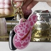 image:imageSonix x Sanrio Character Keychain Case Compatible with Apple AirTag  Protective AirTag Cover Keychain  PochaccoCowgirl