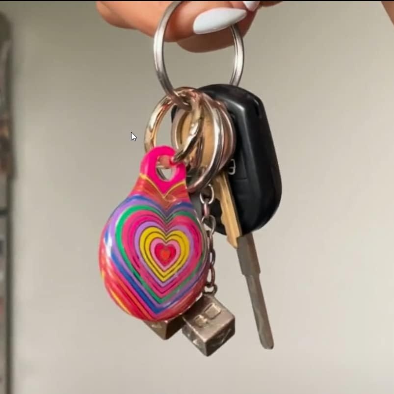image:imageSonix Cases for Apple AirTags with Gold Carabiner  AirTag Hard Cover Protective Case  AirTag Holder Keychain  Jelly ApricotRainbow Heart