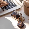 image:imageSonix Cases for Apple AirTags with Gold Carabiner  AirTag Hard Cover Protective Case  AirTag Holder Keychain  Jelly ApricotBrown Tort